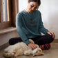 Woman wearing blue crewneck sweatshirt Curative Printing
