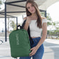 Woman posing with green custom promotional backpack bag by curative printing