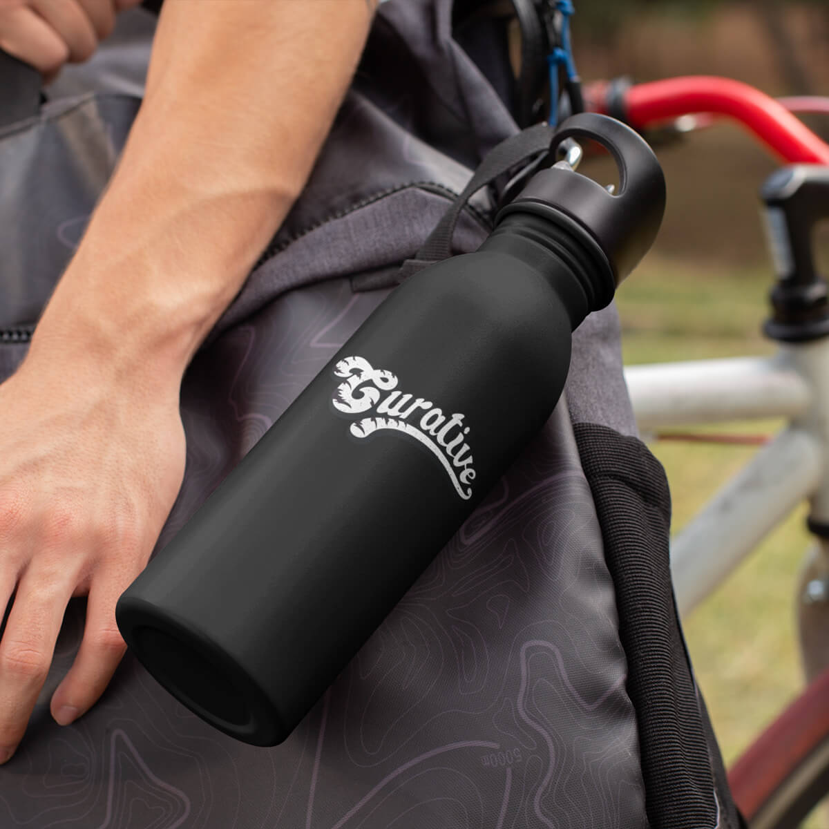 Biker with black aluminum sports bottle custom promotional drinkware by curative printing