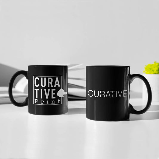 Table with black ceramic mugs custom promotional drinkware by curative printing