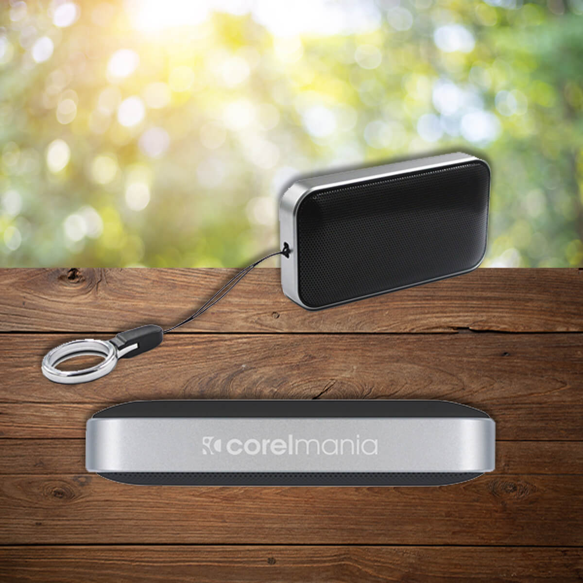 Tethered grey and black portable speaker promotional technology by curative printing