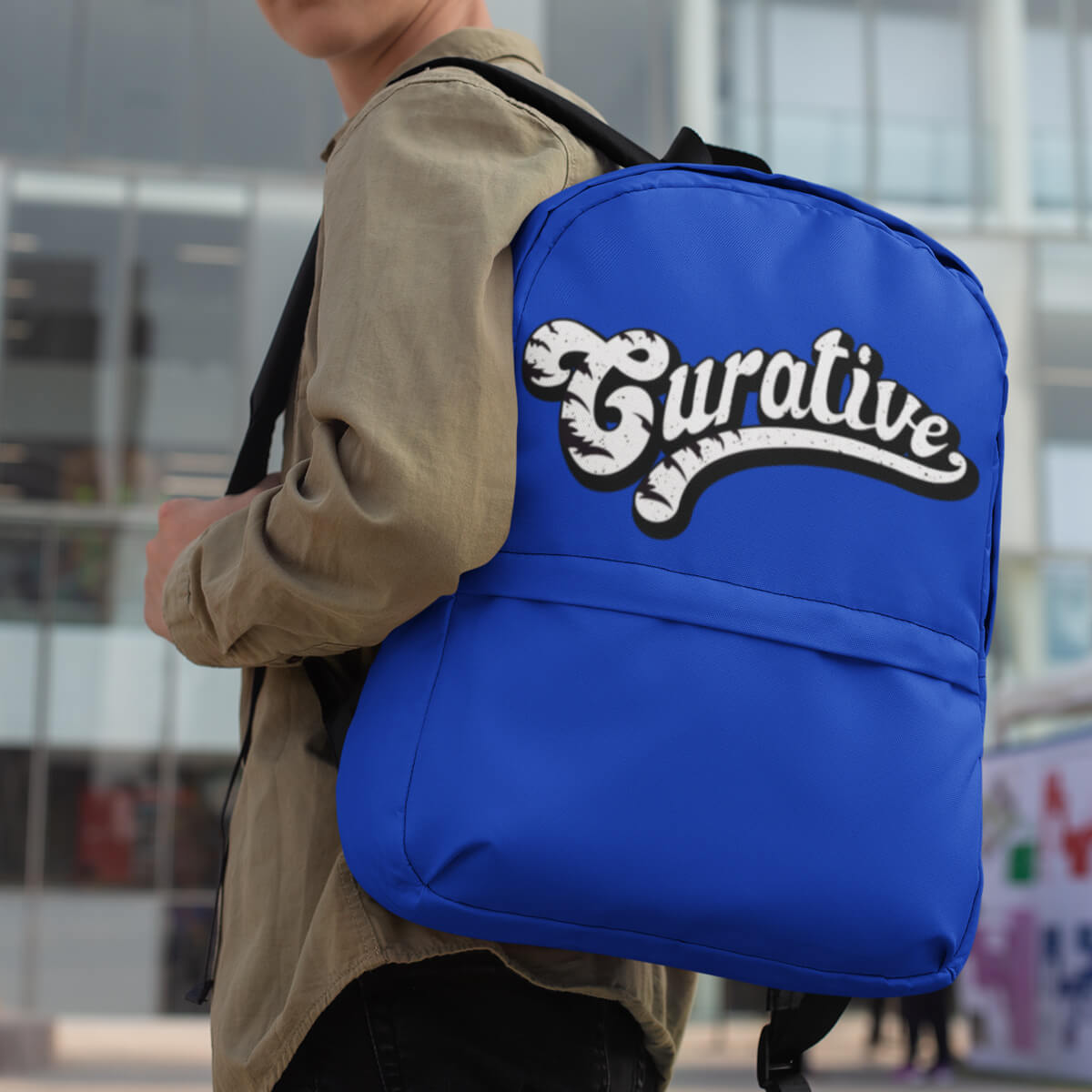 Guy shouldering custom promotional backpack bag by curative printing