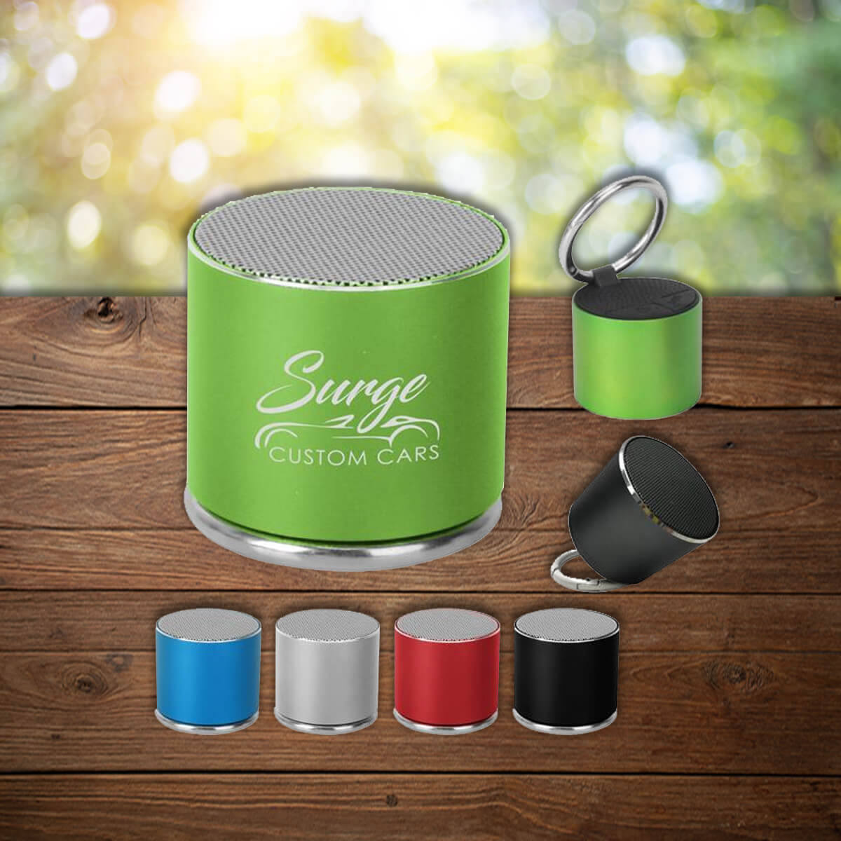 Small round chrome colored portable speaker promotional technology by curative printing