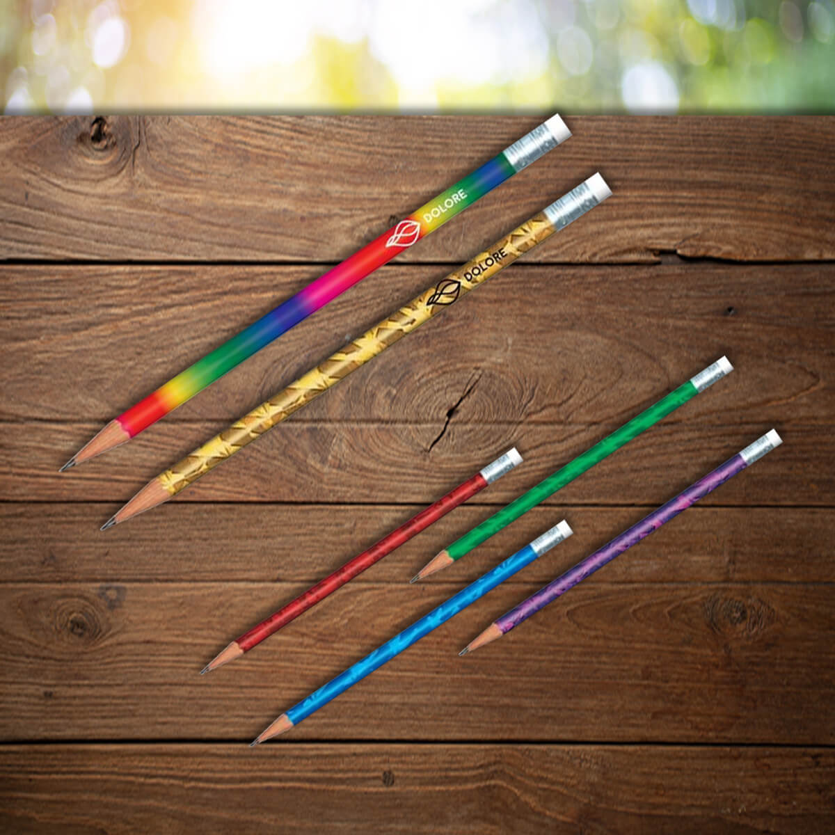 Variety of patterns, colors and imprints shown on custom pencils promotional writing implements by curative printing