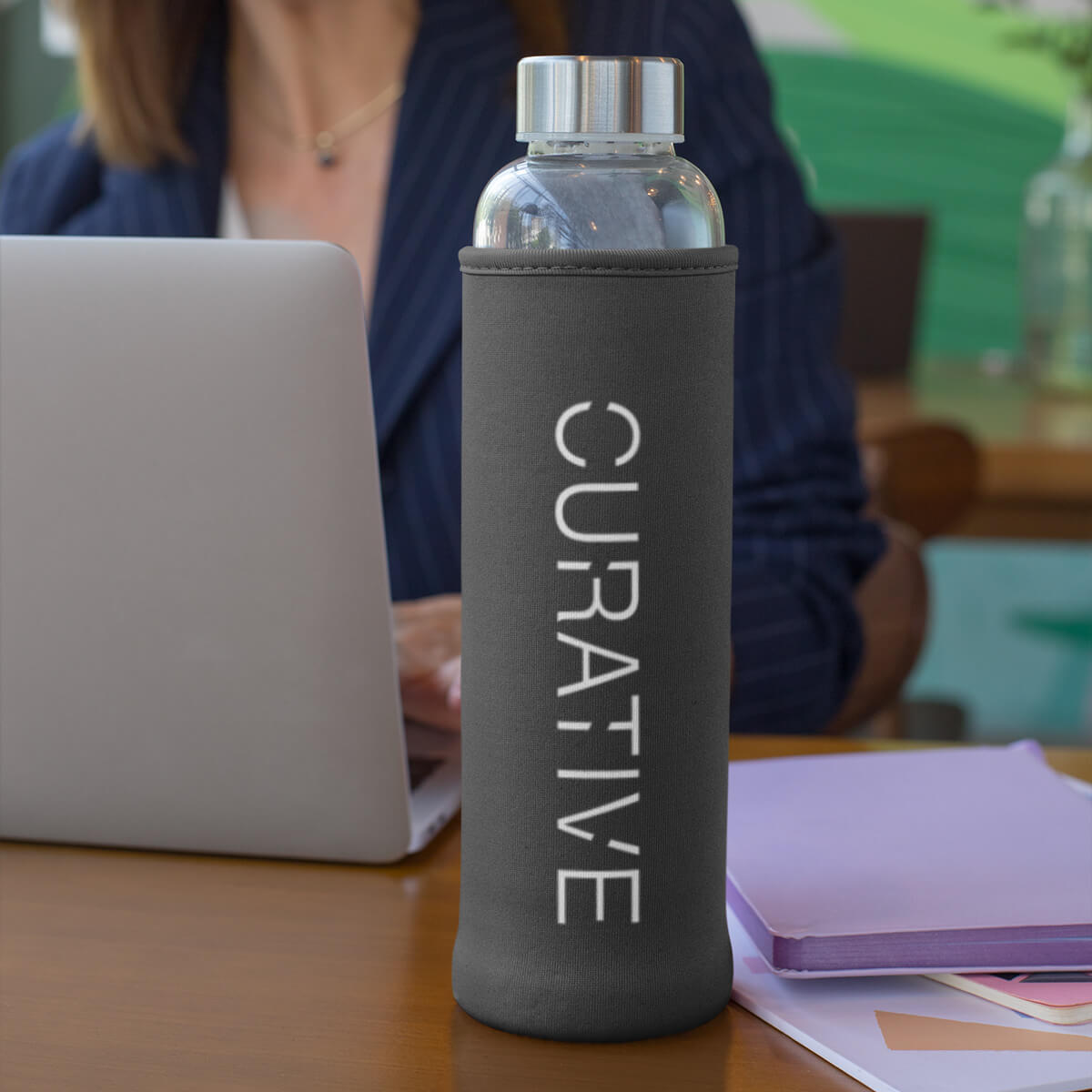 Desk with grey can cooler custom promotional drinkware by curative printing