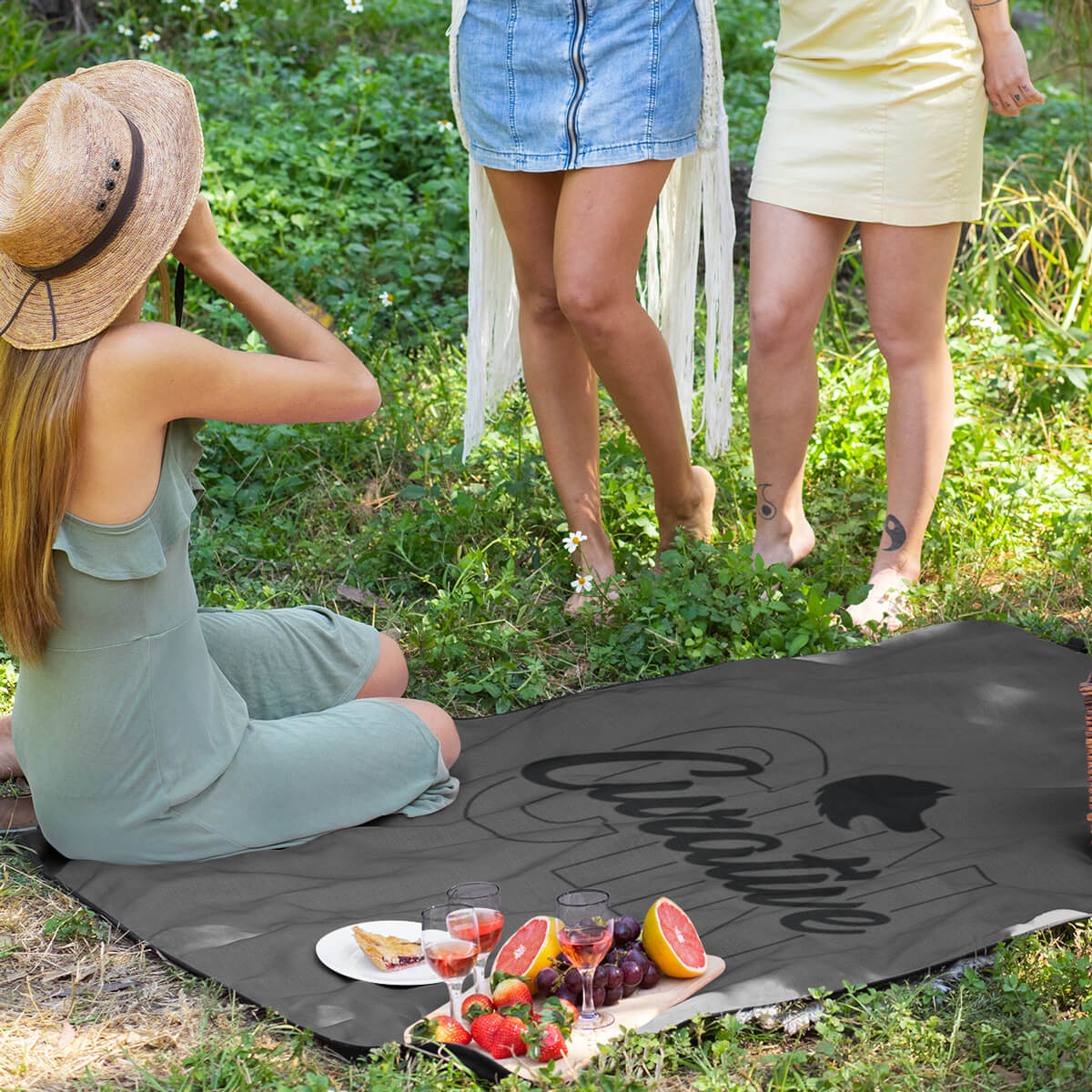 Picnic on a grey with black imprint custom promotional roll-up blankets by curative printing