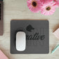 Desktop with flowers and logo imprinted mouse pad promotional technology by curative printing
