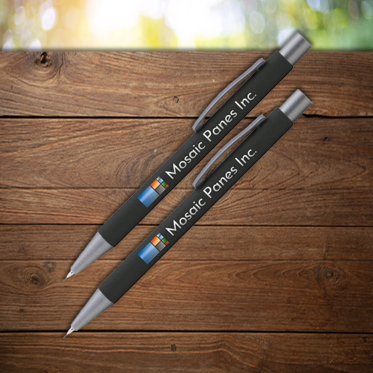 Black mechanical pencil with multi color imprint shown on custom pencils promotional writing implements by curative printing