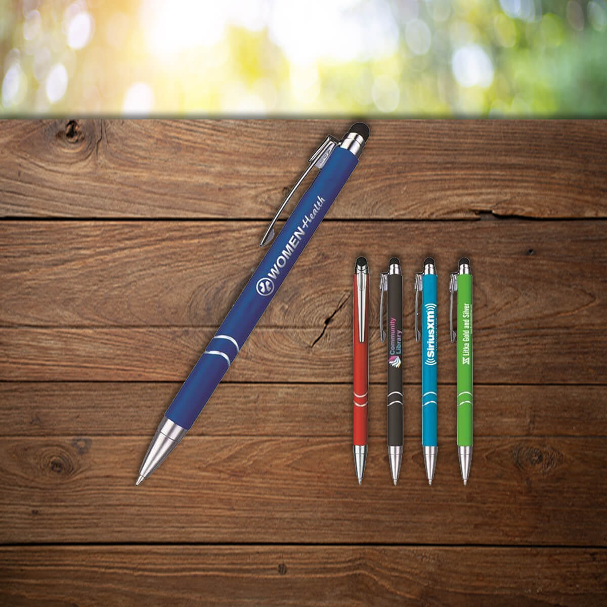 Color variety shown of metal pens with branding and stylus end promotional writing implements by curative printing