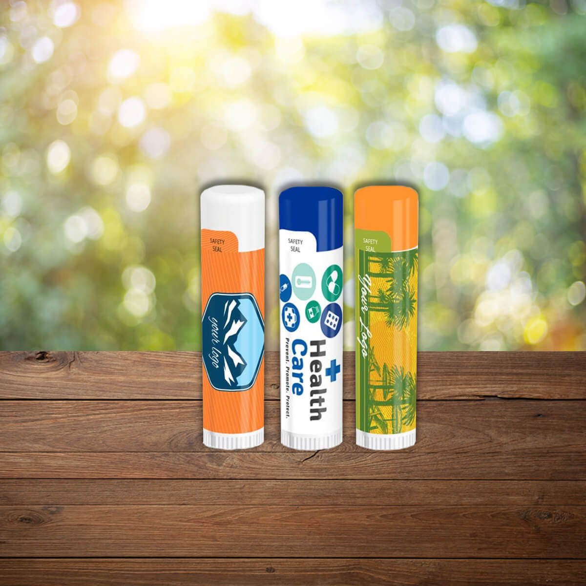 Three tubes with colorful packaging logo imprinted lip balm chapstick promotional wellness & safety by curative printing