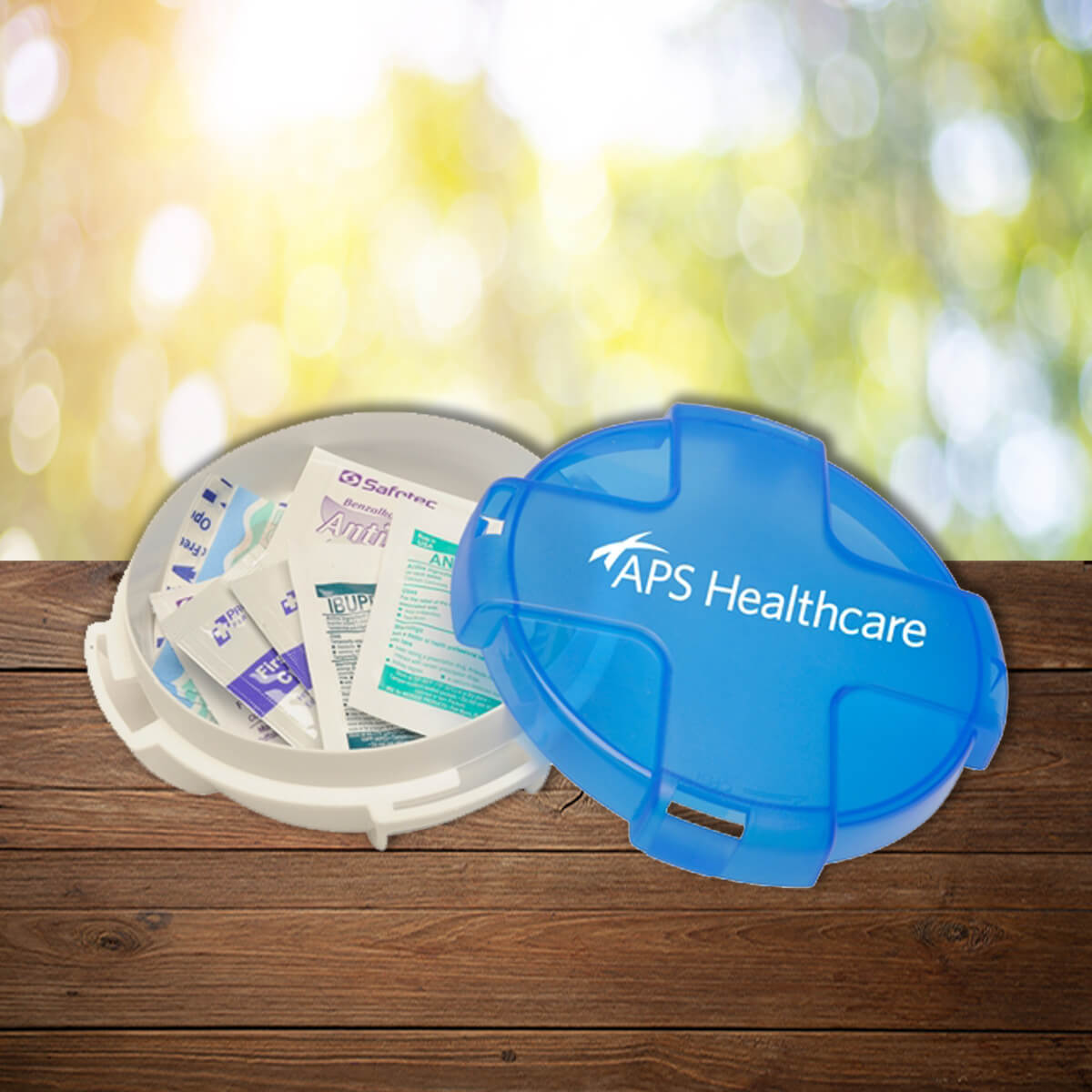 White and blue round logo imprinted first aid kit promotional wellness & safety by curative printing