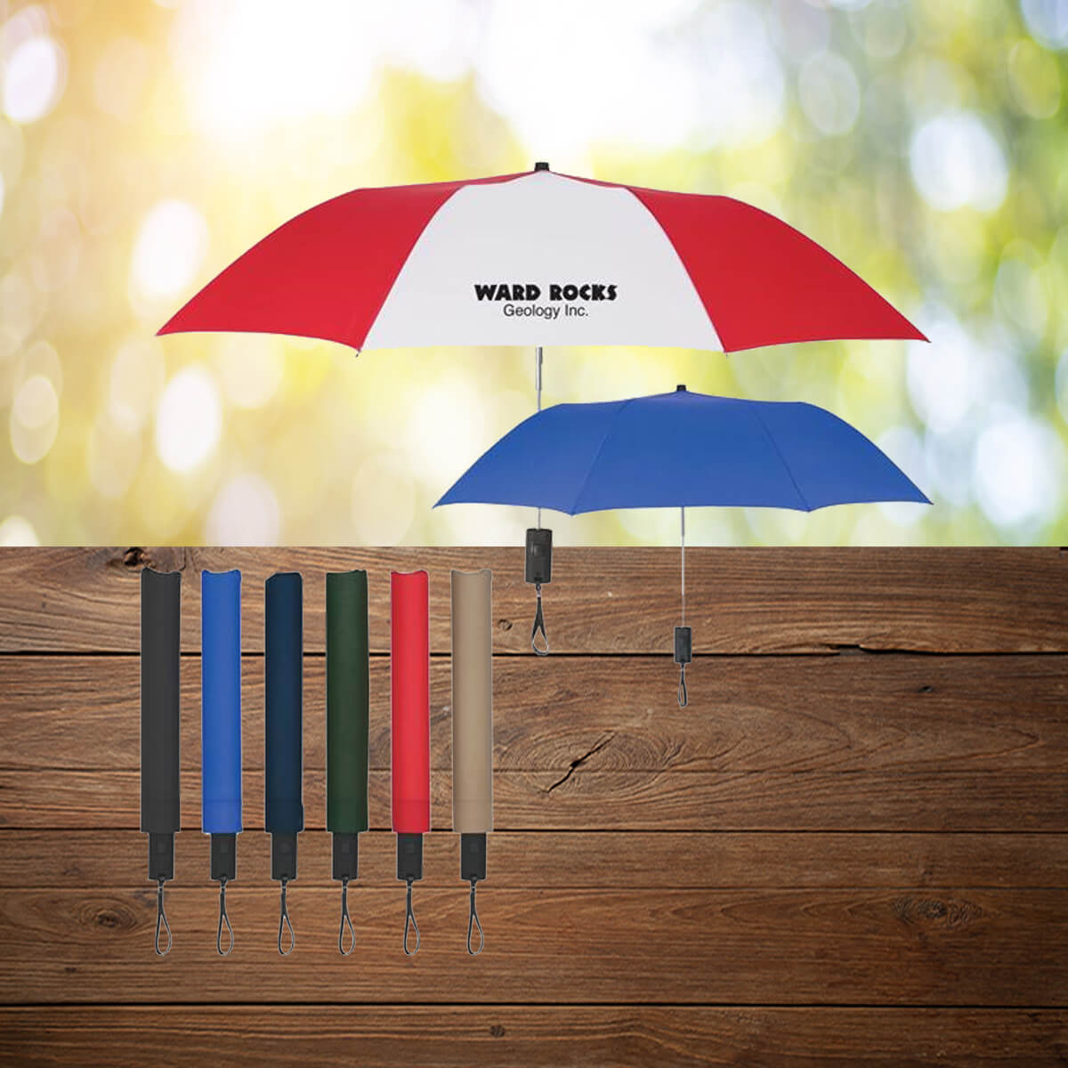Sold color compact auto open umbrellas on display by Curative Printing.