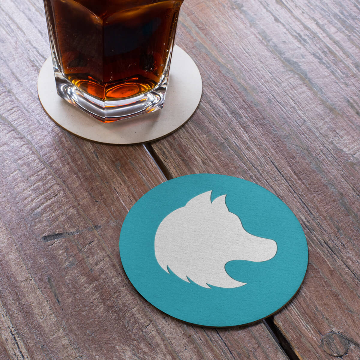Table top with round turquoise coaster custom promotional drinkware by curative printing