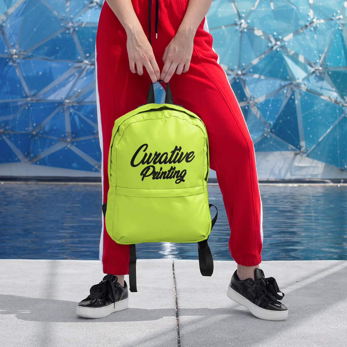 Woman with neon custom promotional backpack bag by curative printing