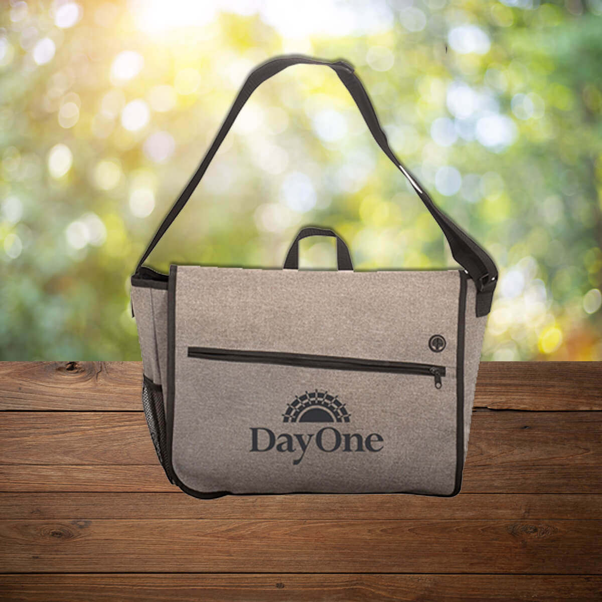 Tan logo'd custom promotional messenger bags by curative printing