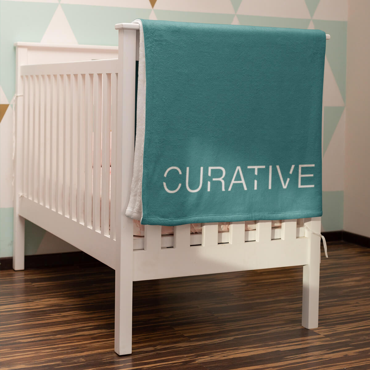 Crib with turquoise custom promotional throw blankets by curative printing