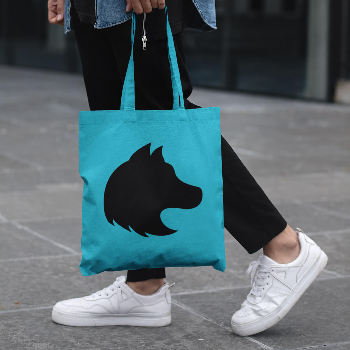 Turquoise with black imprint custom promotional tote bags by curative printing